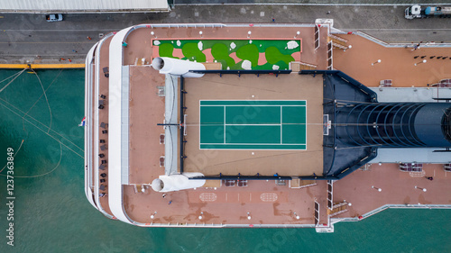Sports court on the bow of the upper deck of a large and luxurious cruise ship