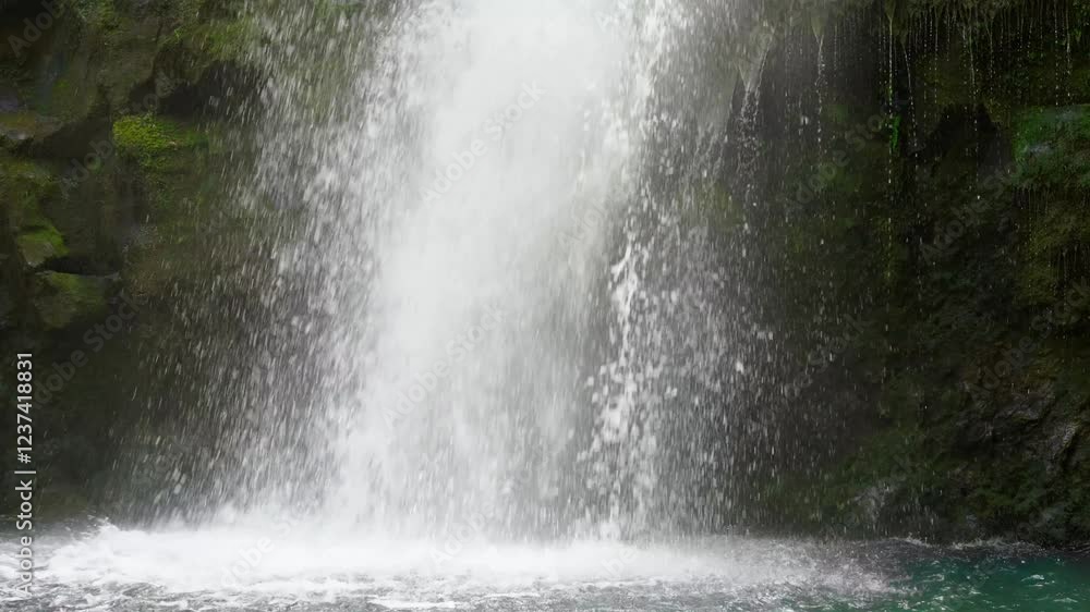 Close-up video of the bottom of Upper Waikani Falls or Three Bears Falls along the Road To Hana in Maui, Hawaii. 4k slow-motion. Close-up video of the bottom of Upper Waikani Falls or Three Bears Falls along the Road To Hana in Maui, Hawaii. 4k slow-motion.