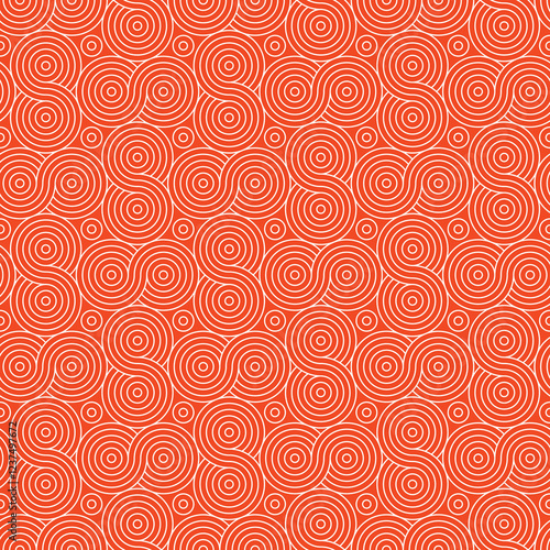 Design a seamless spiral background with elegantly swirling, repeating spirals that vary in size and spacing to evoke dynamic movement and depth.