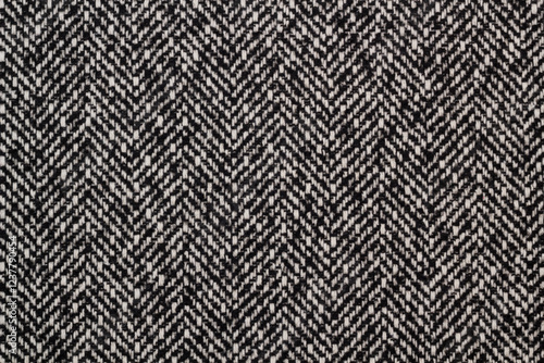 Fabric coat gray tweed. Color texture of the coat fabric close-up.