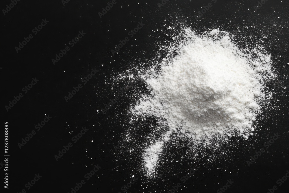 Baking soda pile sodium bicarbonate isolated on black background Baking soda pile sodium bicarbonate isolated on black background