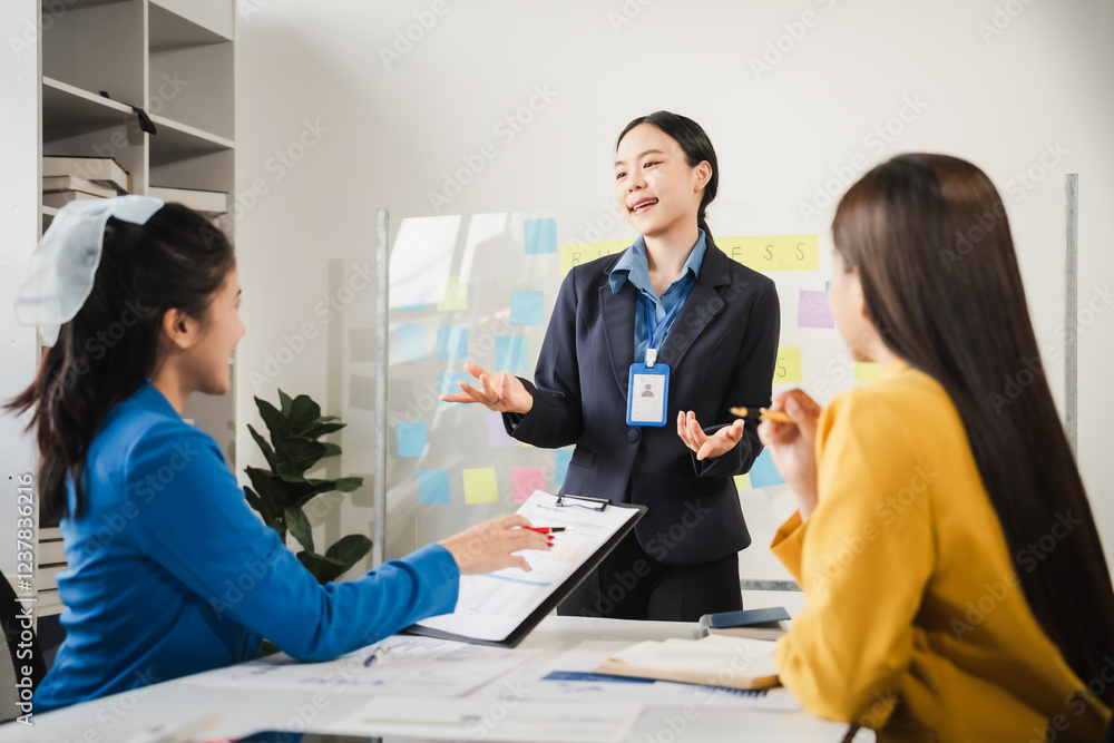Female business leaders come together in conference room for their annual meeting, actively participating, asking questions, enriching seminar, Asian people, only women, Proposals and comments. Female business leaders come together in conference room for their annual meeting, actively participating, asking questions, enriching seminar, Asian people, only women, Proposals and comments.