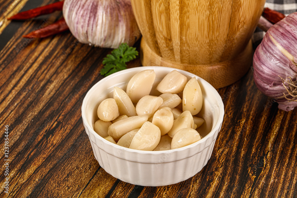 Tasty aroma marinated garlic cloves Tasty aroma marinated garlic cloves