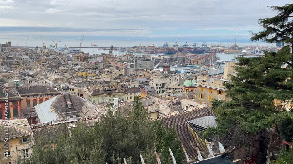 Panorama of city of Genoa from observation deck. Port, buildings and architecture of old town of Liguria in Italy. View from above on sunny winter day in 2025. Panorama of city of Genoa from observation deck. Port, buildings and architecture of old town of Liguria in Italy. View from above on sunny winter day in 2025.