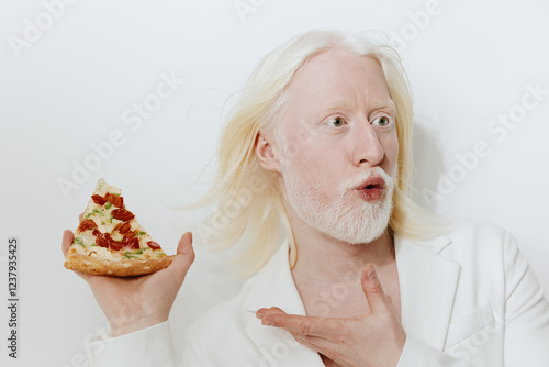 Person with light hair and beard holding a slice of pizza against a white background, expressive pose The image conveys joy and enthusiasm, perfect for food related themes photo