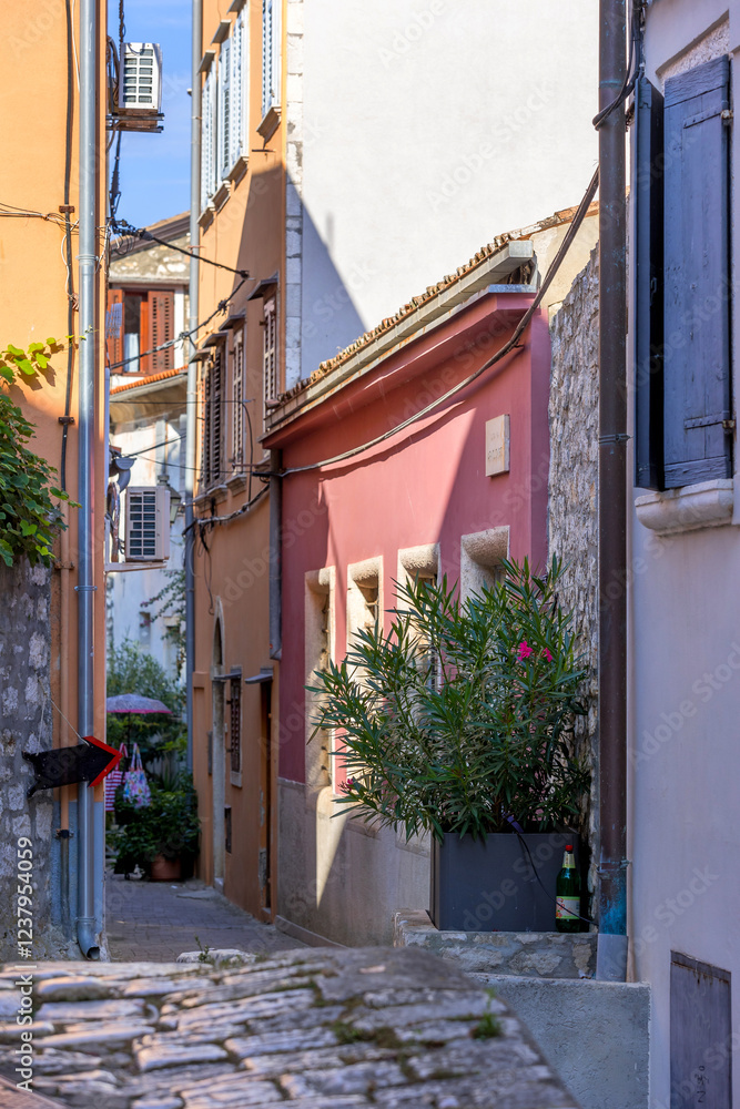 Fototapeta premium Rovinj, Croatia narrow street with colorful houses