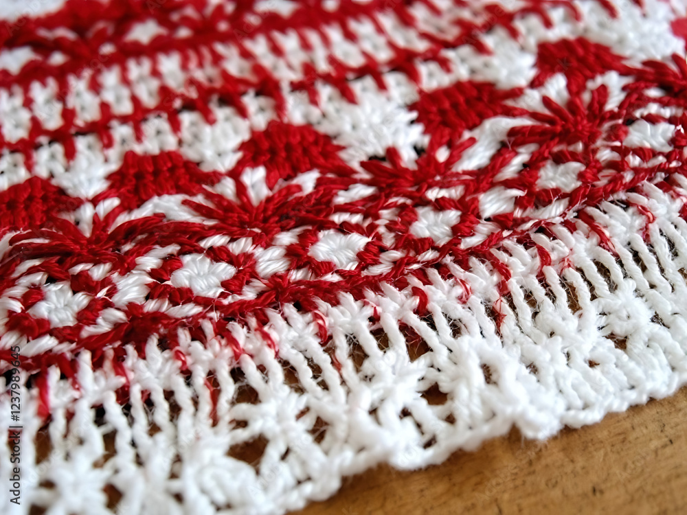Close-up of traditional red and white embroidered textile showcasing intricate design and craftsmanship, traditions, 1st of March, spring, martens, gifts Close-up of traditional red and white embroidered textile showcasing intricate design and craftsmanship, traditions, 1st of March, spring, martens, gifts