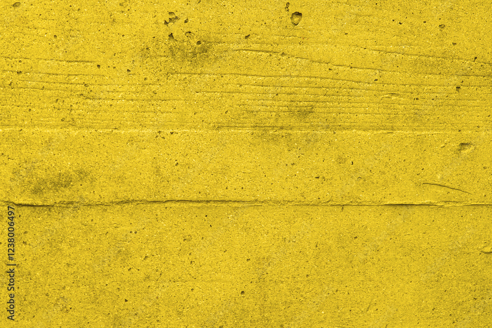 Deep yellow wall old paint background texture of plaster and grey cement
