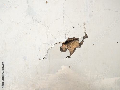 broken and collapsed wall, broken wall background, building structures damaged by earthquake affect or bad construction. Hole in wall. Texture wall pattern and crack background. Copy space for text