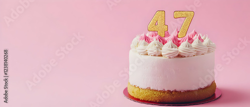 Happy Birthday 47th with gold letters on a light pink background photo