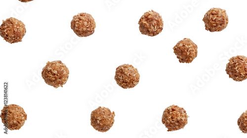 Crunchy cereal balls falling on transparent background photo