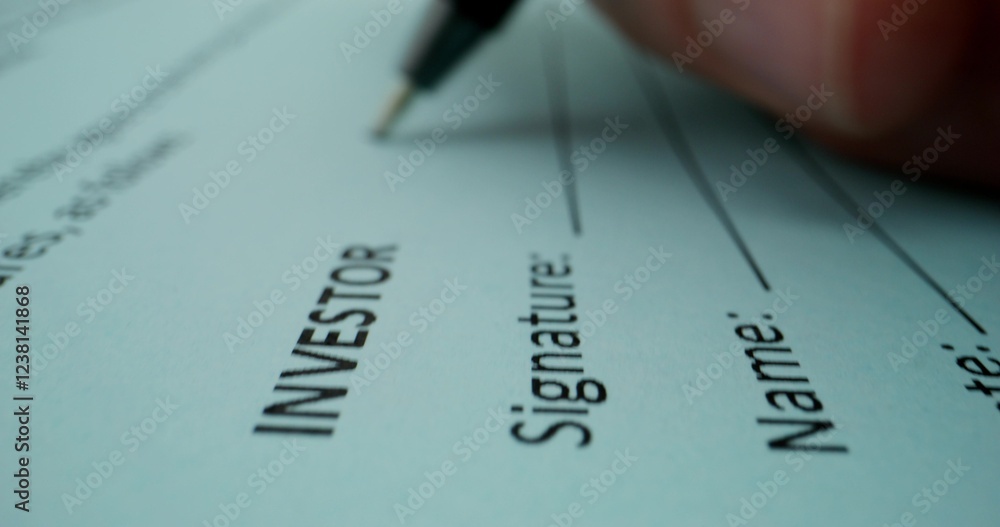 The man puts his signature on the document on behalf of the investor, close-up of his signature, an unrecognizable person The man puts his signature on the document on behalf of the investor, close-up of his signature, an unrecognizable person