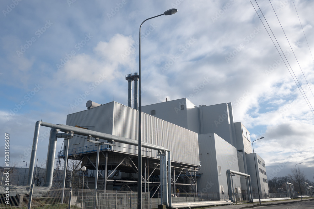 A coal-fired power plant emits greenhouse gases into the atmosphere.