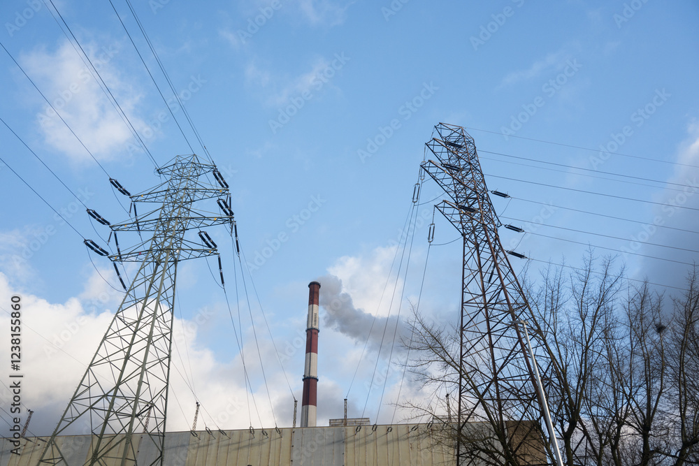 A coal-fired power plant emits greenhouse gases into the atmosphere.