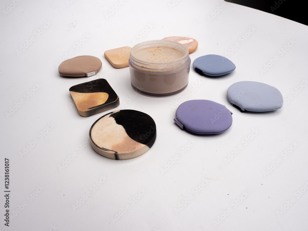 Cosmetic sponges, powder,top view, Pattern made of colorful beauty blenders. Flat lay. Face sponge powder isolated on white Cosmetic sponges, powder,top view, Pattern made of colorful beauty blenders. Flat lay. Face sponge powder isolated on white