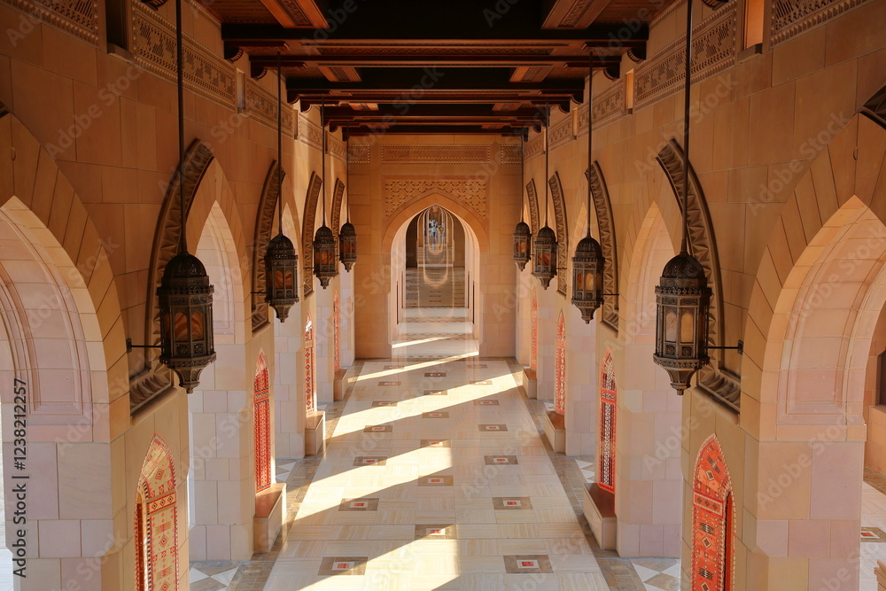 The Sultan Qaboos Grand Mosque in Muscat, Oman, with archways and details