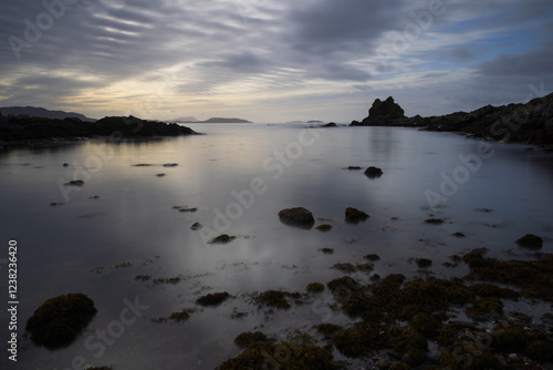 Beautiful morning light on a remote bay, Isle of Kerrea, Inner Hebrides, Scotland, UK. photo