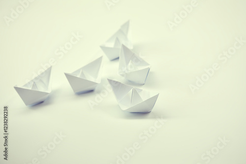 Wallpaper Mural paper boats on the white background, business concept Torontodigital.ca