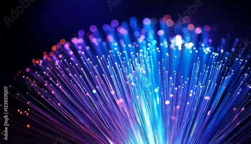 Fiber optic cable glowing in blue and purple hues, with sharp light trails and a blurred background, leaving space for text overlay