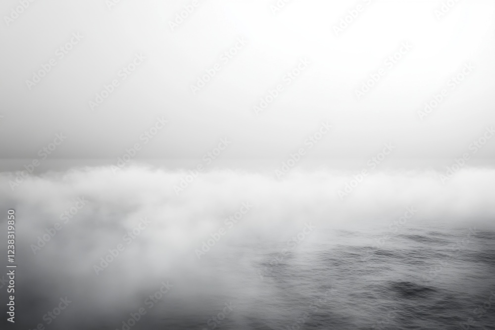 Foggy sea and sky, monochrome palette. Ideal for themes of mystery, serenity, or travel. Foggy sea and sky, monochrome palette. Ideal for themes of mystery, serenity, or travel.