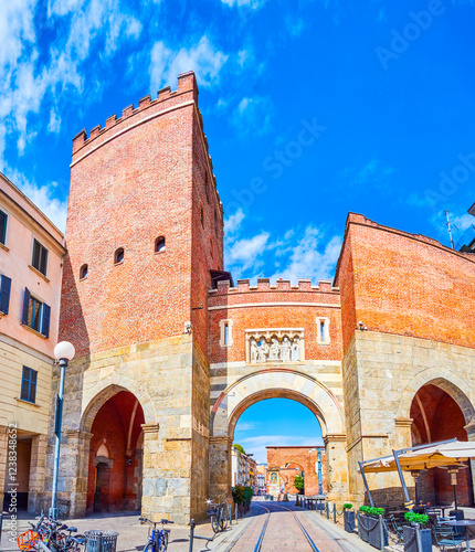 The view through Porta Ticinesse, the medieval gate in Milan, Italy photo