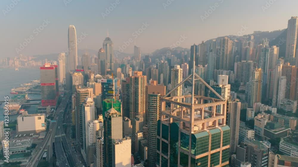 HONG KONG, CHINA - FEBRUARY 2, 2025: Stunning skyline view showcasing modern architecture and urban landscape at sunrise in Hong Kong HONG KONG, CHINA - FEBRUARY 2, 2025: Stunning skyline view showcasing modern architecture and urban landscape at sunrise in Hong Kong