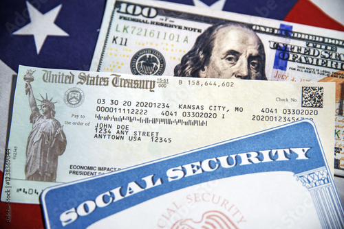U.S. Treasury check, SSN and American dollar bill with flag in the backdrop, close up. Social Security card and treasurey check concept background