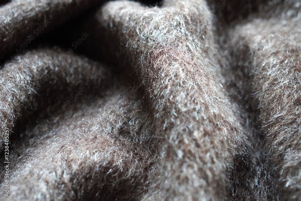 Naklejka premium brown background with soft, warm and cozy blanket texture
