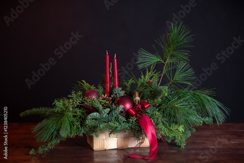 Christmas arrangements with candles and fir branches. Xmas decorations.