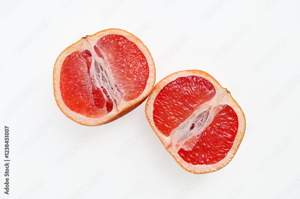 cut grapefruit two halves isolated on white background cut grapefruit two halves isolated on white background