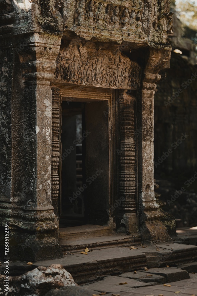 Ancient stone temple entrance with carvings. Ancient stone temple entrance with carvings.