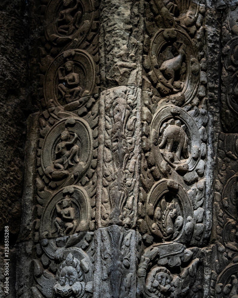 Intricate stone carvings on ancient temple walls. Intricate stone carvings on ancient temple walls.