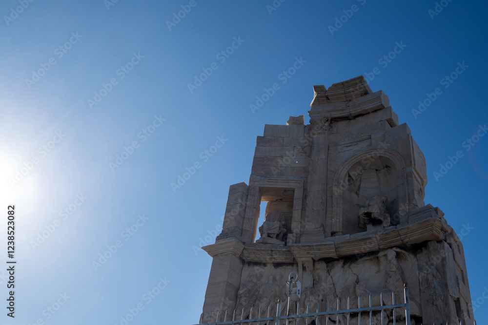 Athens, Greece, Philopappos Monument up on the hill, blue sky Athens, Greece, Philopappos Monument up on the hill, blue sky