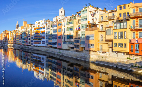 View of Oñar river and towers of Sant feliu and tower  of  Cathedral of Girona,Catalonia, Spain photo