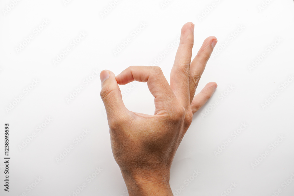 Man showing okay gesture on white background, closeup Man showing okay gesture on white background, closeup