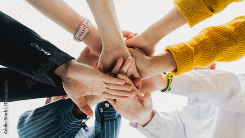 Panoramic teamwork business join hand together,Teamwork power,unity concept.group of friends put their hands together.Volunteer charity work.People joining for cooperation success business.