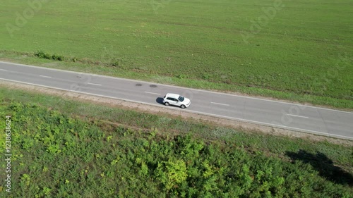 Aerial view of car driving. Road trip. 