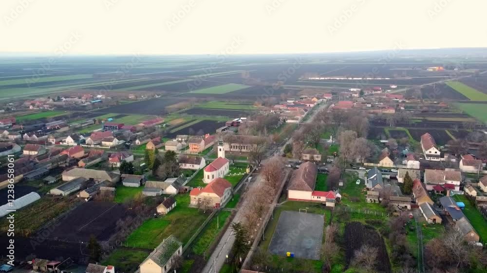 Exploration of rural landscapes and village life in a European countryside setting during early morning hours