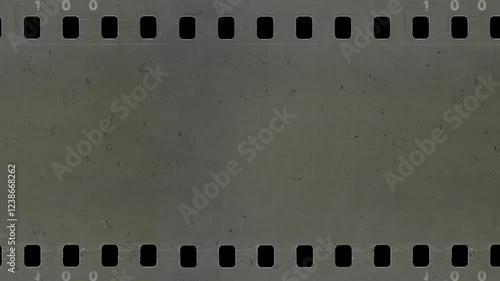 Old celluloid film strip with dust and scratches