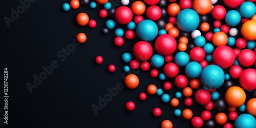 material science nano concept. Colorful spheres scattered on a dark background.