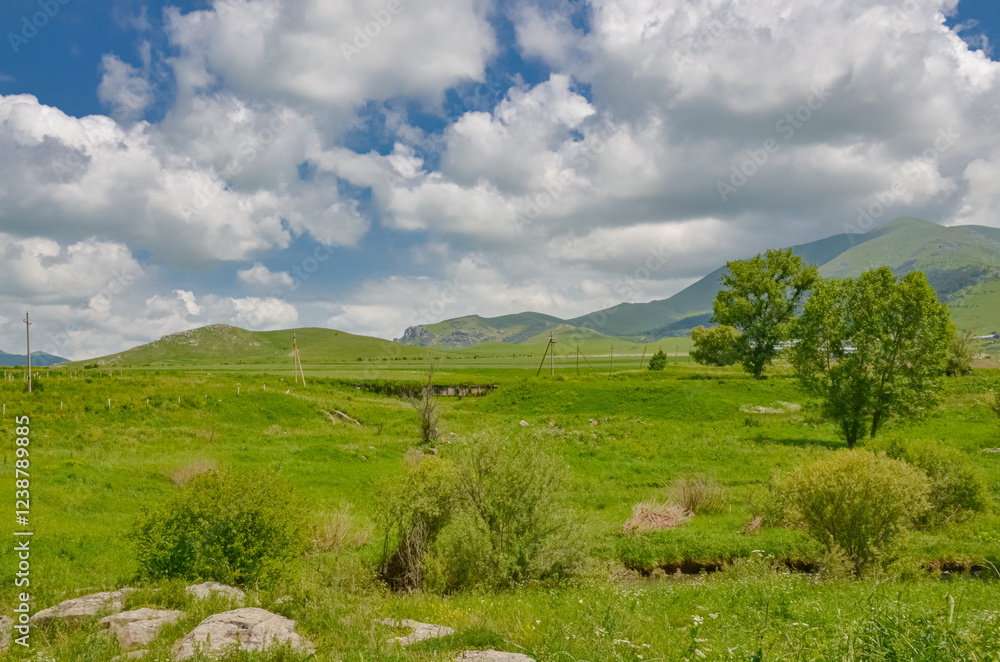 Obraz premium farmlands and Lesser Caucasus mountains around Bovadzor village (Lori province, Armenia)
