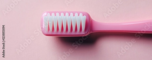 Wallpaper Mural Pink toothbrush head close-up on pink background, oral hygiene, dental care Torontodigital.ca