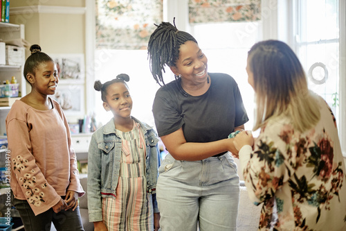 Fotografie Parent, teacher and kids meeting in classroom at Montessori school for education, learning and teaching