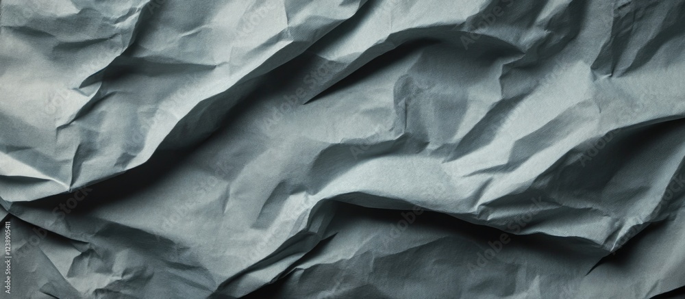 Crumpled Gray Paper Texture Background with Shadows and Folds Crumpled Gray Paper Texture Background with Shadows and Folds