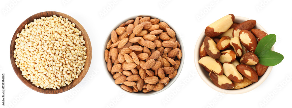 Brazil and other nuts in bowls isolated on white, set. Top view Brazil and other nuts in bowls isolated on white, set. Top view
