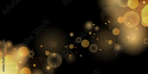 Abstract bokeh gold sparkle glitter on isolated black background. Abstract shiny gold glitter sparkles bokeh background