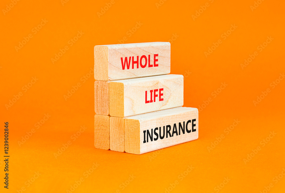 Naklejka premium Whole life insurance symbol. Concept words Whole life insurance on beautiful wooden blocks. Beautiful orange table orange background. Business whole life insurance concept. Copy space.