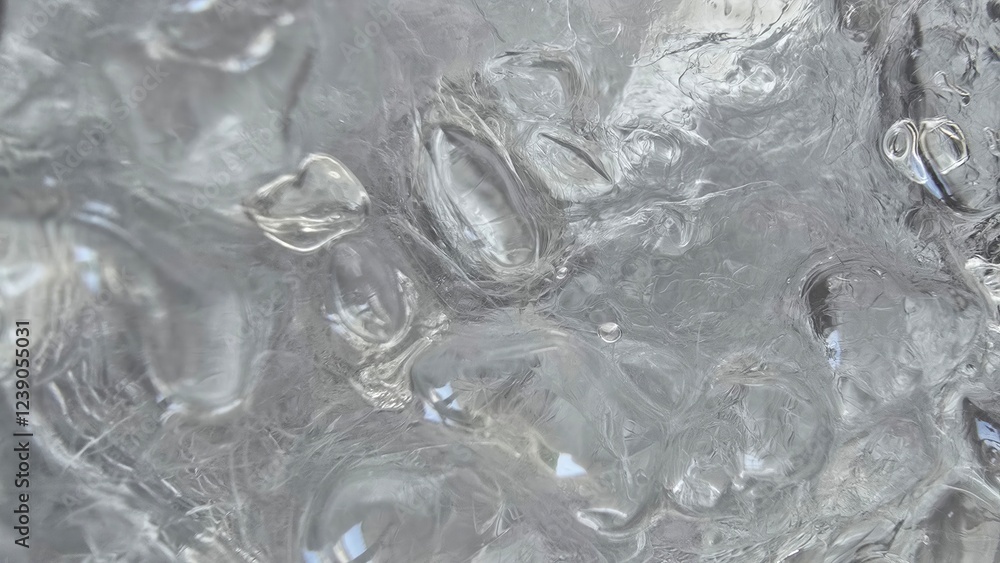 Closeup view of melting ice cubes texture with intricate details Closeup view of melting ice cubes texture with intricate details