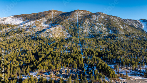 Stateline, NV - January 29, 2025:  Daytime winter aerial image over Stateline, NV - South Lake Tahoe, CA at Lake Tahoe, with hotels, resorts, and casinos in the background. photo