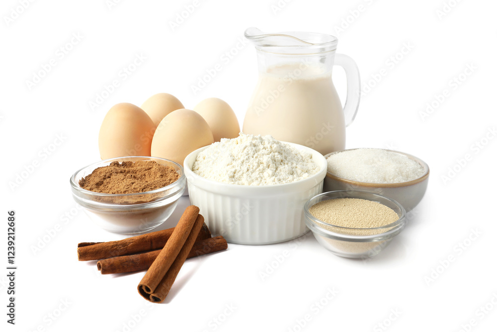Making cinnamon rolls. Different ingredients for dough isolated on white Making cinnamon rolls. Different ingredients for dough isolated on white